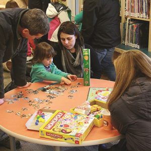 kids playing games at manchester community library